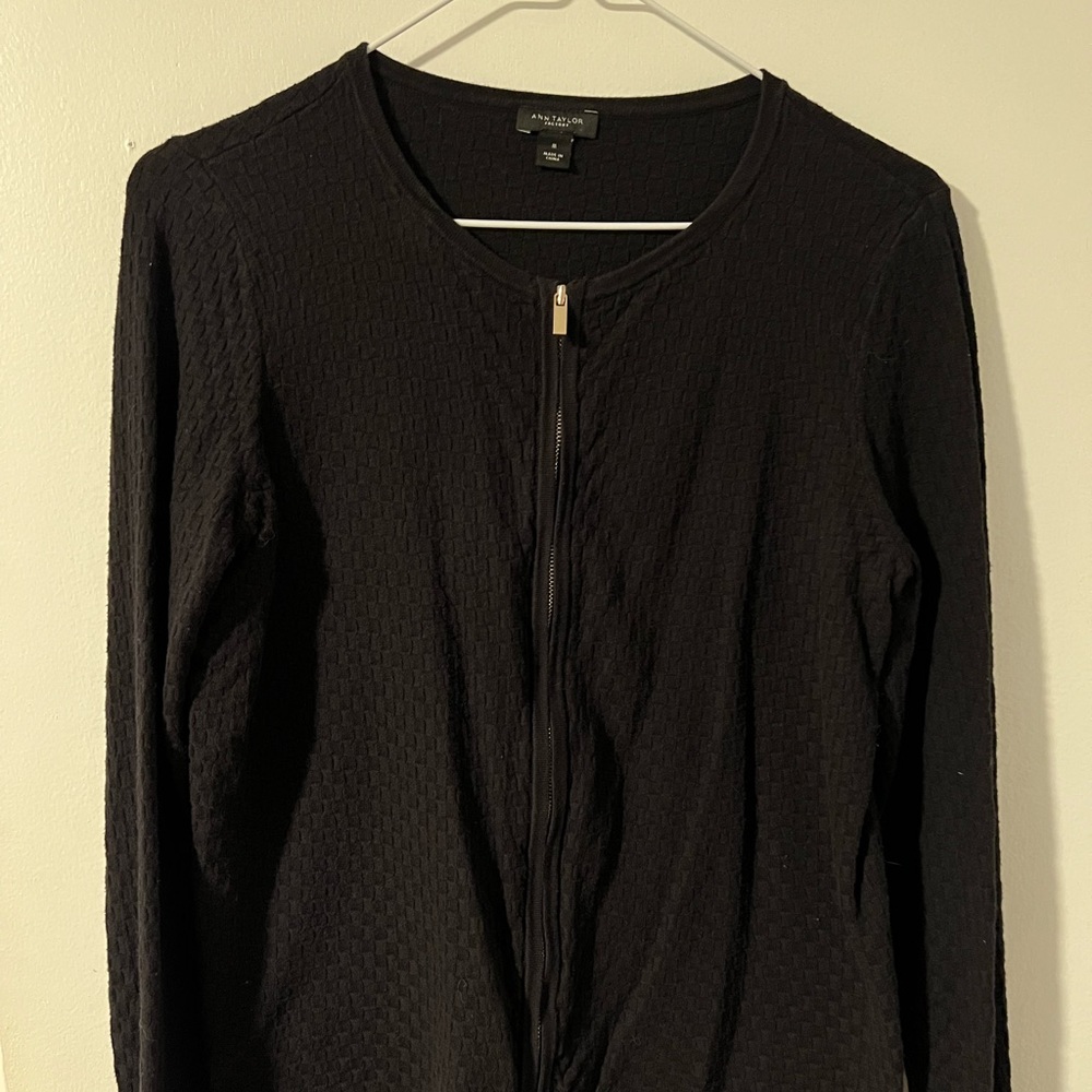 Ann Taylor black sweater.  Zipper in the front, size medium.